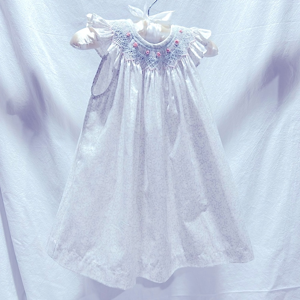 6months.  Edgehill Collection. Smocked Dress. Button back closure.